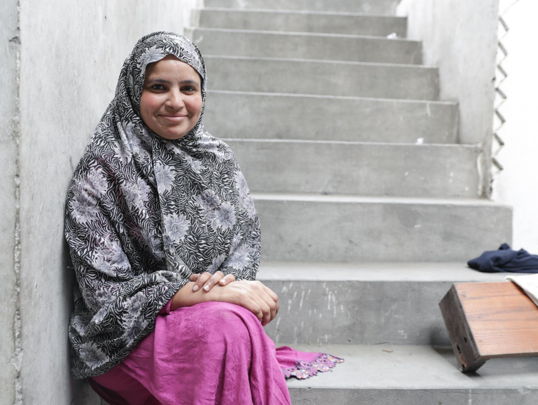 Safiya* setzt sich für Heimarbeiterinnen in Pakistan ein